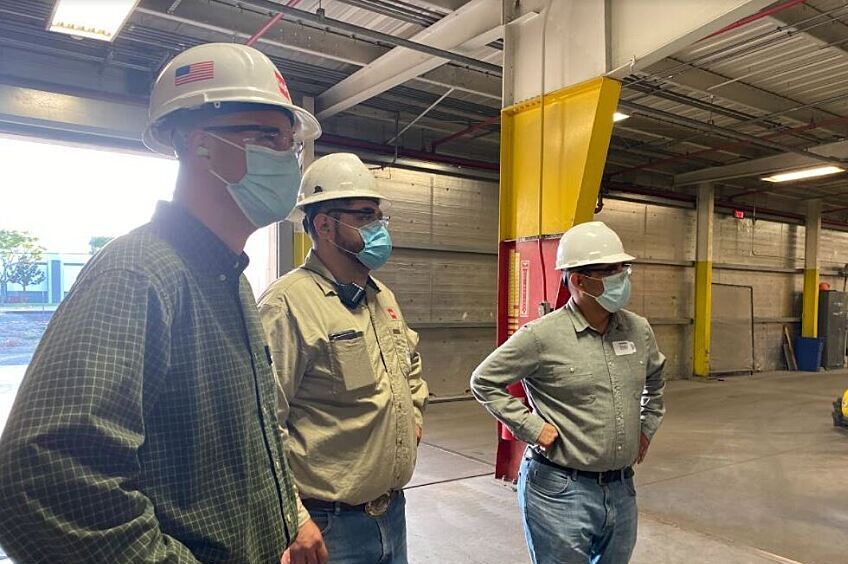 GAF employees in a warehouse